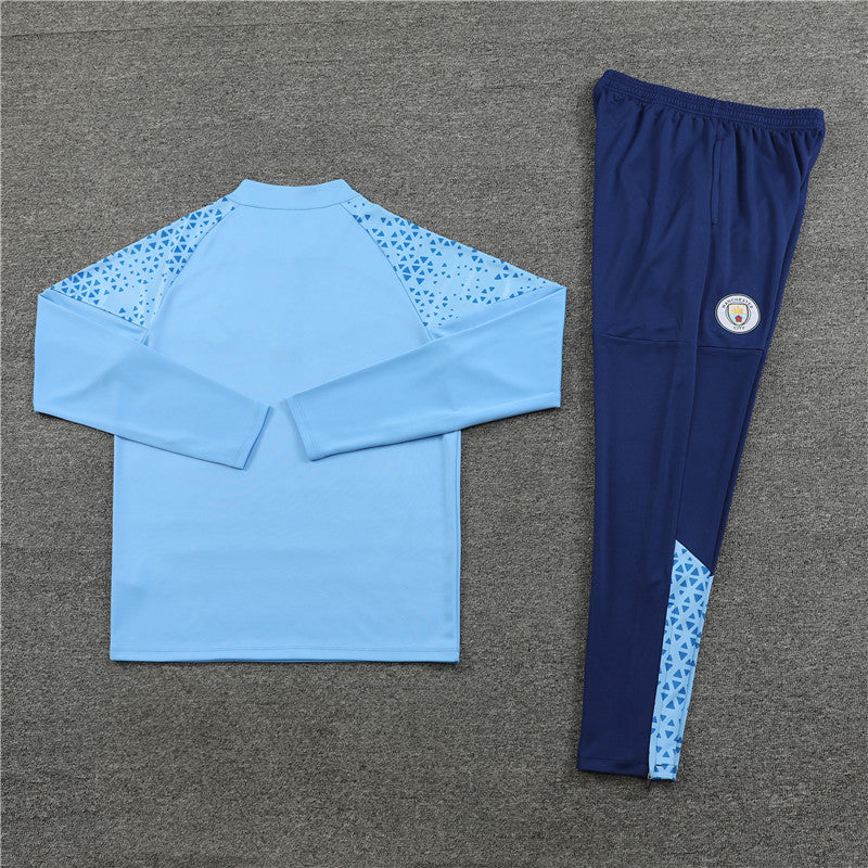 Kit de Treino Manchester City 2023/24 Meio Zíper Azul Claro