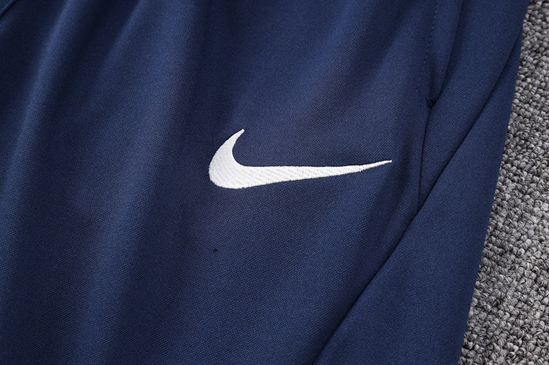 Conjunto Nike Dri-Fit Azul escuro e vermelho