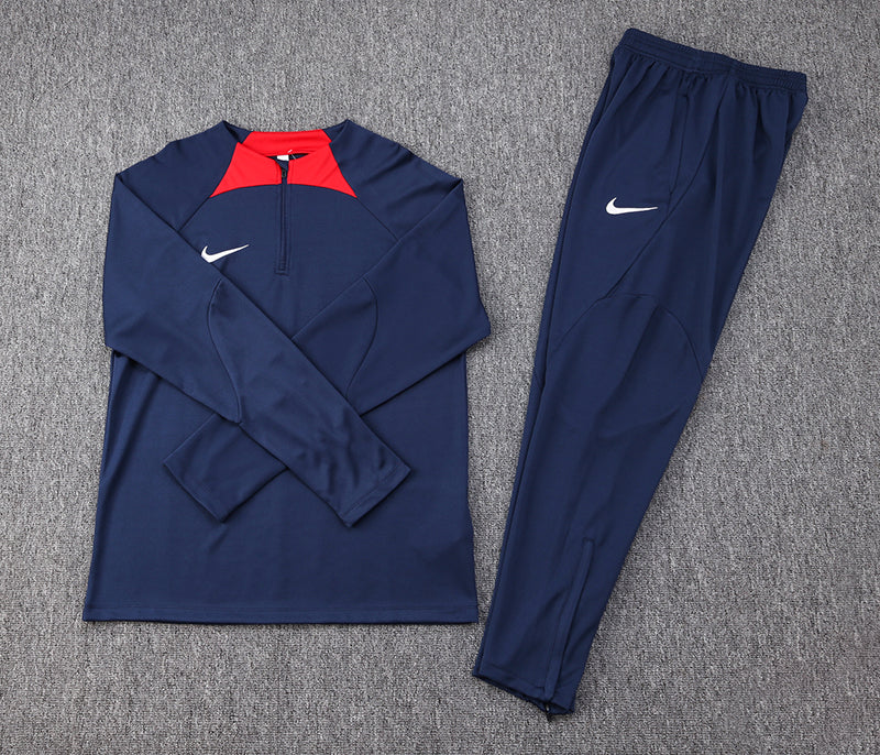 Conjunto Nike Dri-Fit Azul escuro e vermelho