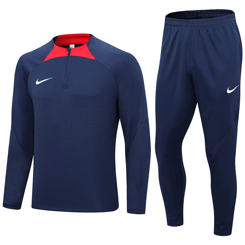 Conjunto Nike Dri-Fit Azul escuro e vermelho