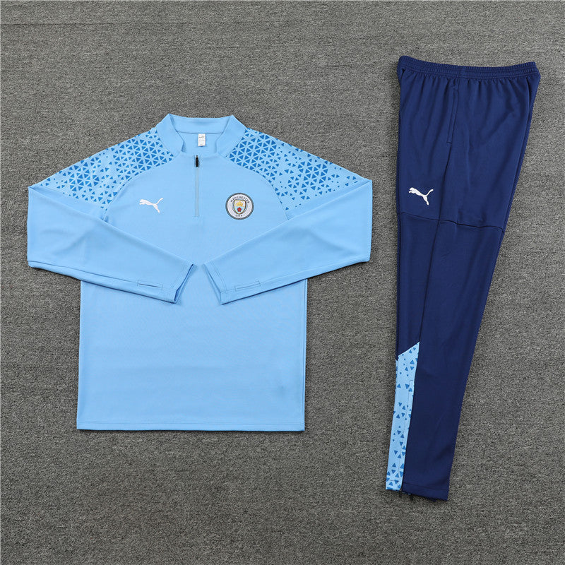 Kit de Treino Manchester City 2023/24 Meio Zíper Azul Claro